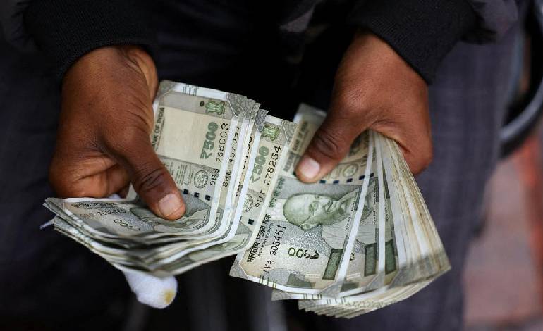 Rupee appreciates 17 paise to 95.56 against US Dollar in early trade